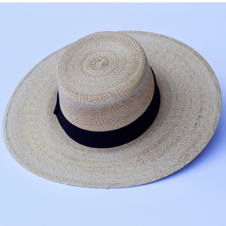 Cordobes hat is handmade by our artisan Luis Roberto Valdés in Jaracuaro Michoacán México. * Palm Leaf hat * size M (56-58) Artisan Boater Hat With Curved Brim For Beach, Artisan Wide Brim Panama Hat For Beach, Artisan Toquilla Straw Panama Hat With Flat Brim, Artisan Wide Brim Panama Hat For Vacation, Artisan Panama Hat With Flat Brim In Toquilla Straw, Artisan Panama Hat With Curved Brim For Beach, Artisan Beach Sun Hat In Natural Color, Artisan Natural Panama Hat For Vacation, Artisan Natural Hat Band For Beach