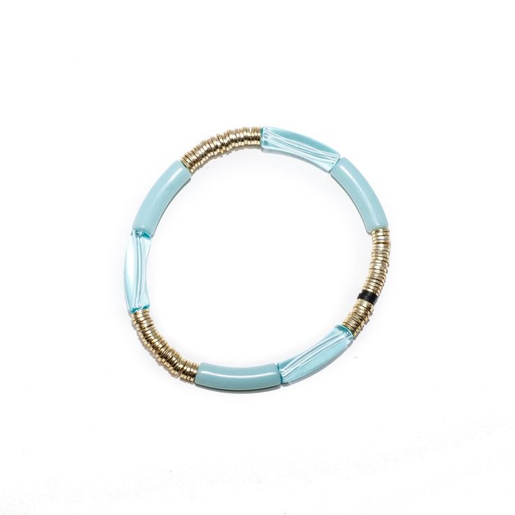 Features: *NEW CUSTOM DESIGN* 4mm light blue and aquamarine curved acrylic beads 4mm 14k gold plated Indian discs 4mm Black rubber beads 7-inch elastic stretch band one size fits most Adjustable Blue Stackable Stretch Bracelet, Blue Adjustable Stackable Stretch Bracelet, Trendy Blue Stackable Stretch Bracelet, Adjustable Light Blue Jewelry With Spacer Beads, Blue Flexible Jewelry For The Beach, Adjustable Blue Stretch Bracelet With Spacer Beads, Flexible Blue Jewelry For Beach, Trendy Adjustable Light Blue Beaded Bracelets, Flexible Blue Beach Jewelry