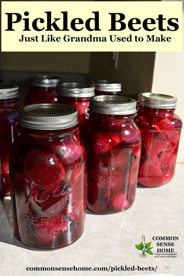 jars filled with pickled beets sitting on top of a white counter next to the words pickled beets just like grandma used to make