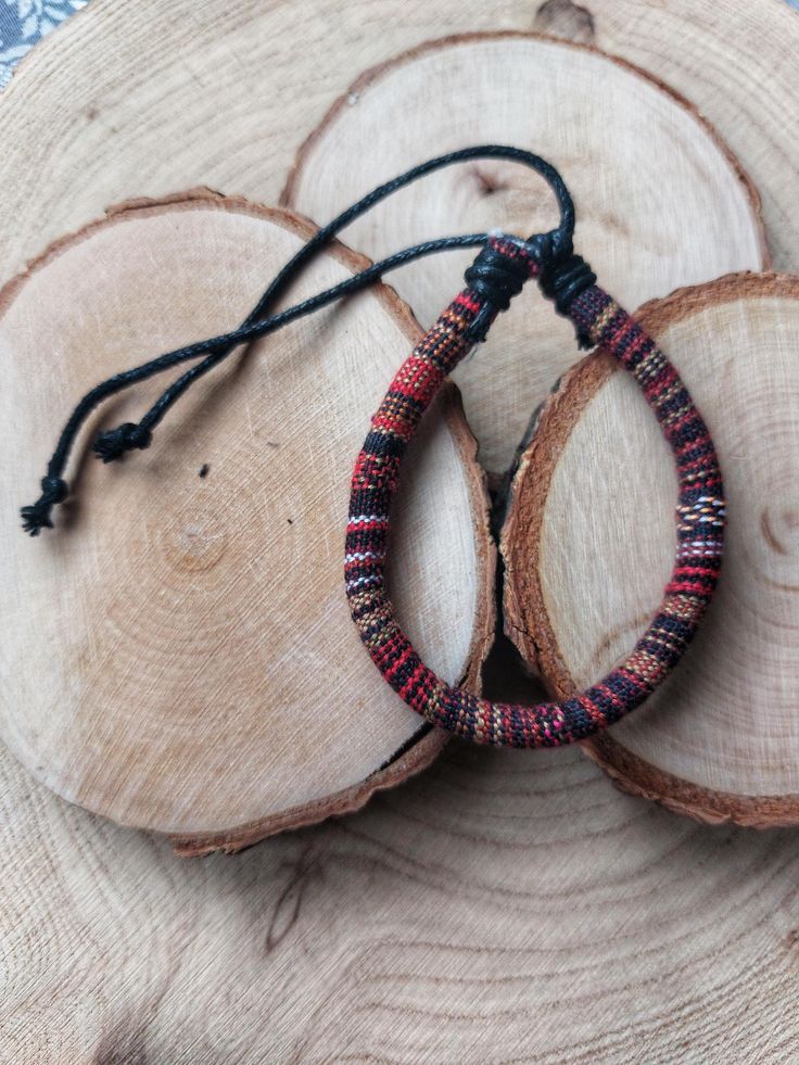 🔔 SALE 🔔 Buy 2 or more products and save 10% on your entire order. Use coupon code "SALE10". 🔅 BOHO SURFER BRACELET This stylish boho surfer bracelet is the perfect summer accessory for both men and women. Its sizes can be easily adjusted through the sliding knot mechanism.  🌈 COLORS Moody colors build a beautiful Aztec-style pattern that adds a stylish finish to every look.  😍 HAPPINESS Your satisfaction is my priority. I go above and beyond to make sure that my products and services meet Handmade Multicolor Leather Bracelet Casual Style, Casual Beaded Bangle Bracelets, Handmade Casual Wristband For Beach, Casual Brown Leather Beach Bracelet, Handmade Casual Wristband For Everyday, Casual Handmade Wristband For Everyday, Casual Festival Wristband Bracelet, Casual Braided Festival Bracelet, Casual Festival Bracelet With Sliding Knot