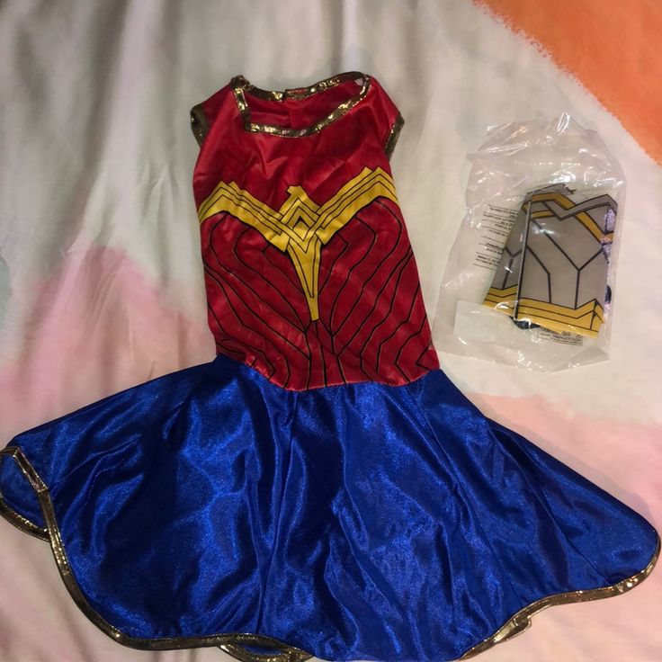 Includes: Dress, Belt, Tiara, Gauntlets, Armband Batman Costume For Girls, Batgirl Halloween, Batgirl Halloween Costume, Wonder Woman Halloween Costume, Dc Wonder Woman, Batman Girl, Superman Boy, Supergirl Costume, Dc Comic Costumes