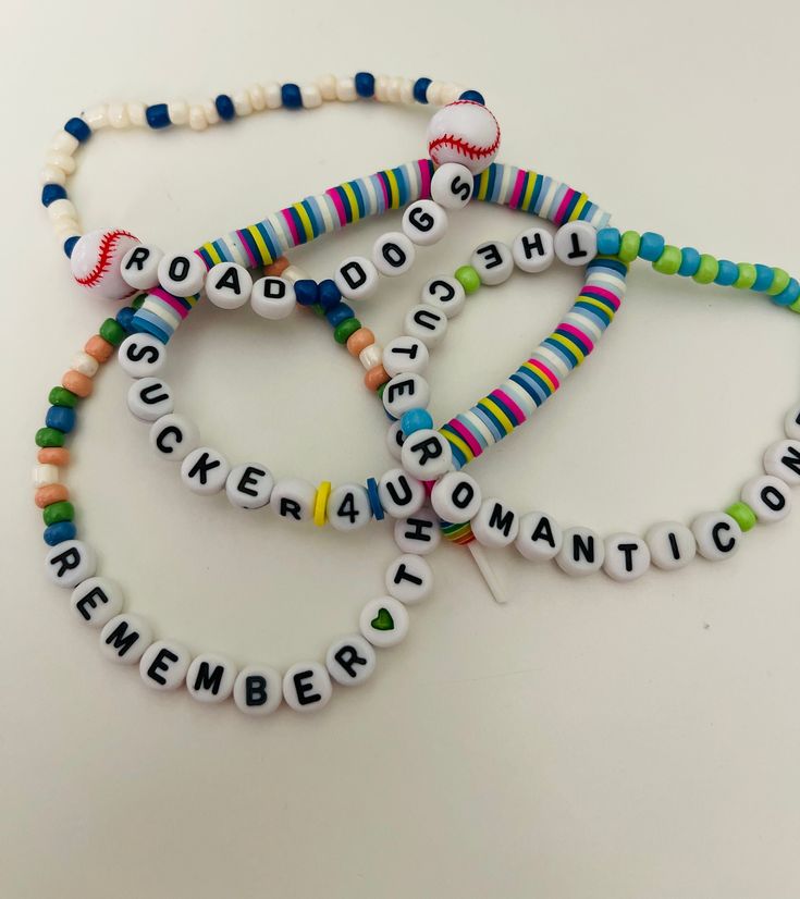 Assorted Jonas Brothers friendship bracelets to trade at concerts or to show off your love for the band!  Bracelets are made with a stretchy material that allows for a comfortable fit for all wrist sizes.  If you have any special requests (ie. colors, lyrics, names, etc) please send us a message! Multicolor Letter Print Beaded Bracelets For Friendship, Trendy Adjustable Friendship Bracelets With Letter Print, Trendy Letter Print Bracelets For Friendship, Trendy Letter Print Friendship Bracelets, Trendy Beaded Bracelets With Letter Print For Friendship, Customized Novelty Wristband For Friendship, Customized Friendship Wristband For Novelty, Customizable Adjustable Friendship Bracelets, Customized Friendship Wristband