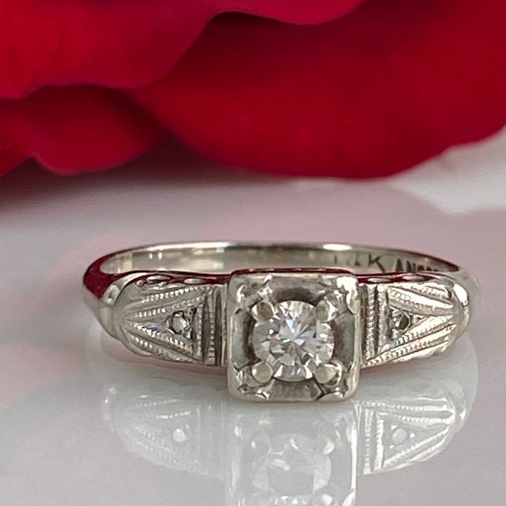 Details: Sweet classic Art Deco diamond ring--this one would make a great engagement ring or just a sweet ring to add to a collection. Would also be a great pinky ring! Please ask all necessary questions prior to placing an order. Measurements: The size is 4 1/2 US, and can be sized for a fee. Condition: The overall all condition of this ring is very good. Classic White Gold Diamond Ring In Platinum, Classic White Gold Platinum Diamond Ring, Classic White Diamond Ring In Platinum, Classic Platinum Diamond Cut Rings, Formal White Gold Ring With Classic Cut, Formal White Gold Rings With Classic Cut, White Gold Rings With Classic Cut For Formal Occasions, Classic Platinum Rings With Brilliant Cut, Classic Engraved Ring With Single Diamond