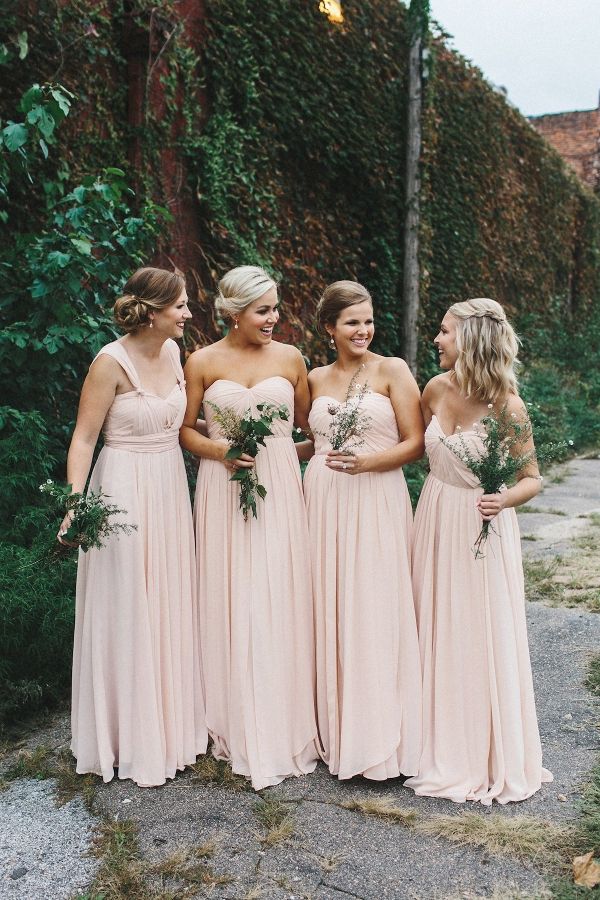 the bridesmaids are all wearing pink dresses