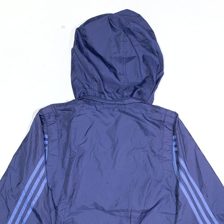 Item is in good used condition. >Size: S >Armpit To Armpit: 20" >Armpit To Cuff: 19" >Collar To Hem: 25" Urban Blue Windbreaker With Double Hood, Casual Blue Hooded Sports Jacket, Blue Urban Hooded Jacket For Outdoor Activities, Urban Blue Hooded Jacket For Outdoor Activities, Urban Style Blue Hooded Jacket For Outdoors, Blue Hooded Track Jacket For Athleisure, Sporty Blue Hooded Jacket For Sports, Blue Athleisure Outerwear With Adjustable Hood, Blue Sporty Windbreaker For Gym