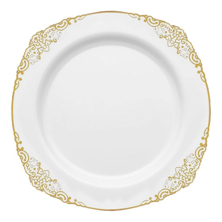 an empty white plate with gold trimmings