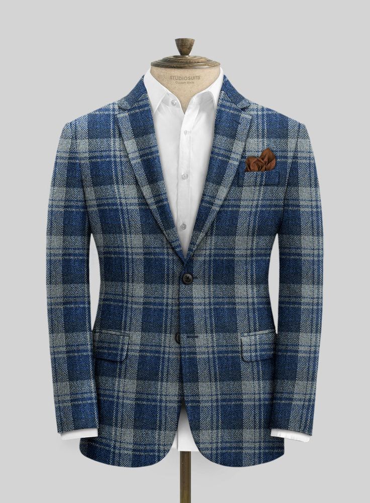 Make brilliant modernity in your fashion with additional flawlessness in your tweed collection. Tailored with pure wool fabric, our Harris Tweed Blue Tartan Jacket is woven in a checks pattern with various shades of fresh and crisp blue color that shows clear signs of prosperity in your look. In addition, this custom-made piece is a great partner for your winter celebrations or casual work wear, which will spruce up your appearance. So wear our fabulous piece that presents itself with a bounty o Luxury Plaid Wool Tweed Jacket, Blue Tweed Jacket For Business Casual, Classic Blue Tweed Outerwear, Plaid Wool Tweed Jacket With Notch Lapel, Plaid Wool Tweed Jacket For Tailoring, Blue Wool Tweed Jacket For Fall, Blue Tailored Tweed Outerwear, Tailored Blue Tweed Outerwear, Luxury Plaid Tweed Jacket Single Breasted