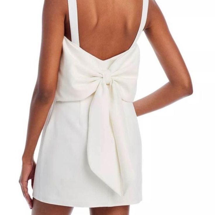 Brand New White Medium Astr Dress With Big Bow On The Back. Great For Engagement Reception Party. Short White Dress With Big Bow In The Back. Sleeveless Mini Dress With Bow For Day Out, Chic Mini Dress With Bow For Day Out, Chic Dress With Bow For Day Out, Chic Day Out Dress With Bow, White Dresses With Bow Tie Back For Day Out, White Dress With Bow Tie Back For Day Out, White Dress With Bow Tie Back For Date Night, White Bow Tie Back Dress For Day Out, Sleeveless Dress With Bow For Day Out