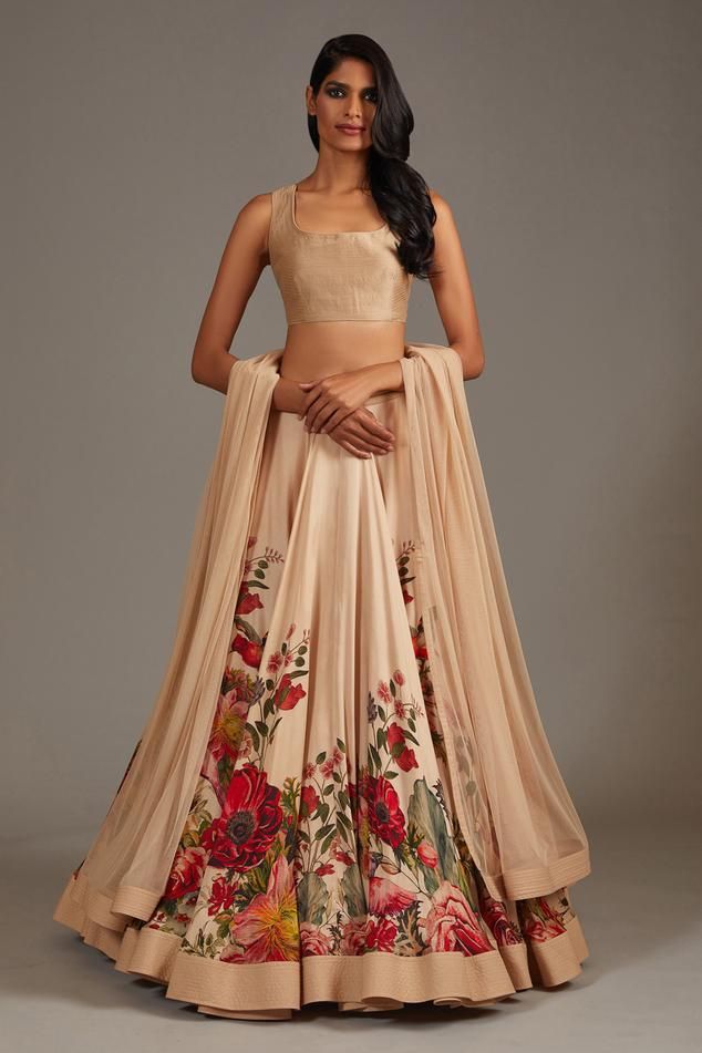 Beige flared lehenga with rafflesia bloom print. Paired with sleeveless square neckline blouse and dupatta.
Components: 3
Pattern: Print 
Type Of Work: Rafflesia Bloom
Neckline: Square 
Sleeve Type: Sleeveless
Fabric: Modal and Chanderi, Lining: Silk
Color: Beige
Other Details: 
Note: The cancan skirt worn by the model is not for sale
Occasion: Bride, Destination Wedding - Aza Fashions Bandhani Lehenga, Editors Note, Simple Lehenga, Lehenga Pattern, Printed Lehenga, Raw Silk Lehenga, Rohit Bal, Lehenga Blouse, Wedding Lehenga