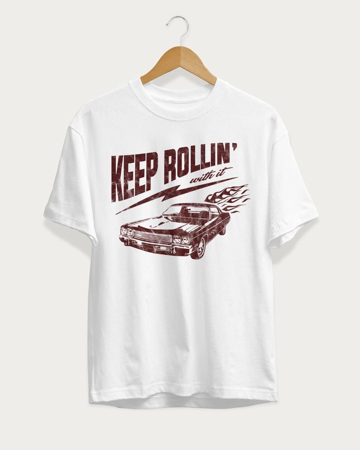 Keep Rollin' Tee – Heartman Retro White Print Crew Neck T-shirt, Retro Short Sleeve T-shirt With Graphic Print, Graphic Tee For Fan Merchandise, Retro T-shirt With Front Print For Fans, Graphic Tee Shirt For Fan Gear, Retro Short Sleeve Shirt With Front Print, Graphic Tee Tops For Fan Merchandise, Retro White Print Short Sleeve T-shirt, Retro White Letter Print T-shirt