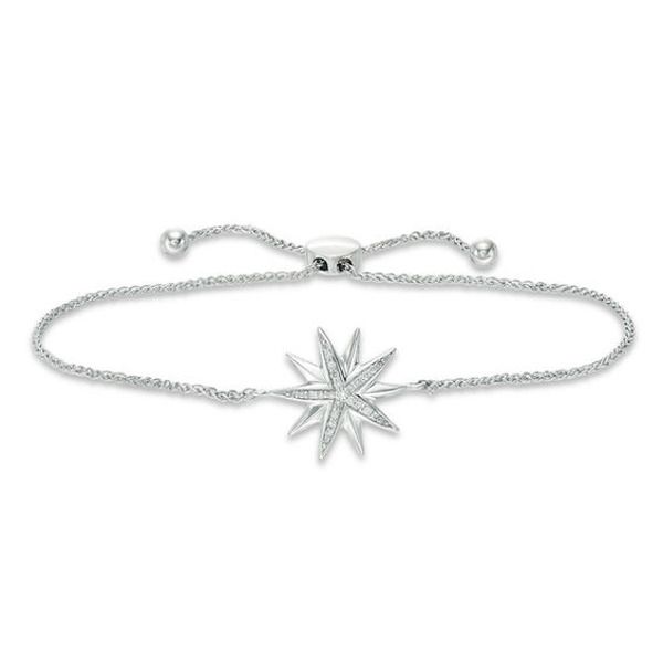 Make a sparkling entrance with this stunning diamond bolo bracelet. Created in sterling silver, this exquisite design showcases a striking sculpted starburst with alternating polished and shimmering diamond-lined arms. Radiant with 1/10 ct. t.w. of diamonds and a brilliant buffed luster, this wheat chain bracelet adjusts up to 9.5 inches in length and secures with a bolo clasp and ball ends. Adjustable Sparkling Fine Jewelry, Sparkling Silver Starburst Jewelry, Adjustable Sterling Silver Dazzling Diamond Bracelet, Adjustable Dazzling Sterling Silver Diamond Bracelet, Silver Star-shaped Formal Jewelry, Silver Star-shaped Jewelry For Formal Occasions, Silver Star-shaped Jewelry For Formal Events, Elegant Starburst Jewelry For Anniversary, Elegant Sparkling Starburst Jewelry