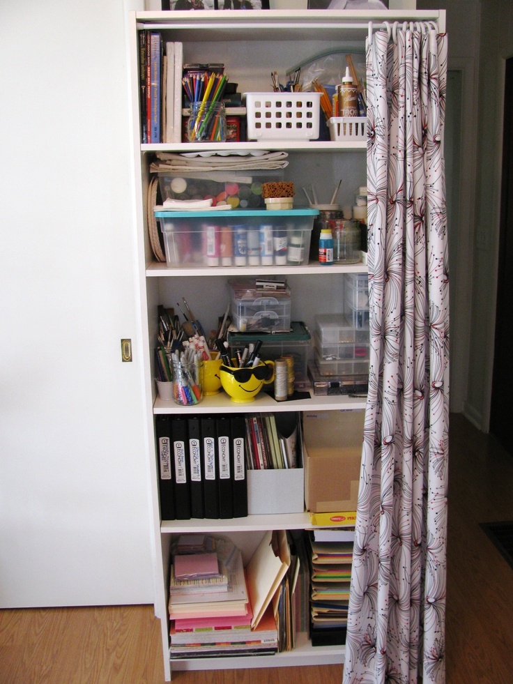 a bookshelf filled with lots of crafting supplies