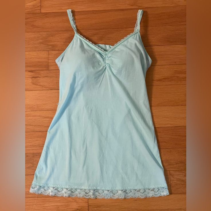 This Top Is New Without Tags . Never Worn. Material Is Very Soft And Stretchy. Pit To Pit 17 Inches . Top Of Shirt To Hem 24.5 Inches. Adjustable Straps. Measurements Are Approximate. Item Ships From A Pet Free Smoke Free Home. Review My Closet And Bundle To Save On Shipping! Ouestions? Please Leave In Comments. Fitted Cotton Camisole For Daywear, Fitted Light Blue Spaghetti Strap Top, Fitted Light Blue Camisole Tank Top, Fitted Light Blue Camisole, Light Blue Spaghetti Strap Top, Blue Tank Camisole With Built-in Bra, Blue Stretch Camisole With Built-in Bra, Light Blue Stretch Camisole Top, Blue Spaghetti Strap Tank Top With Lace Trim