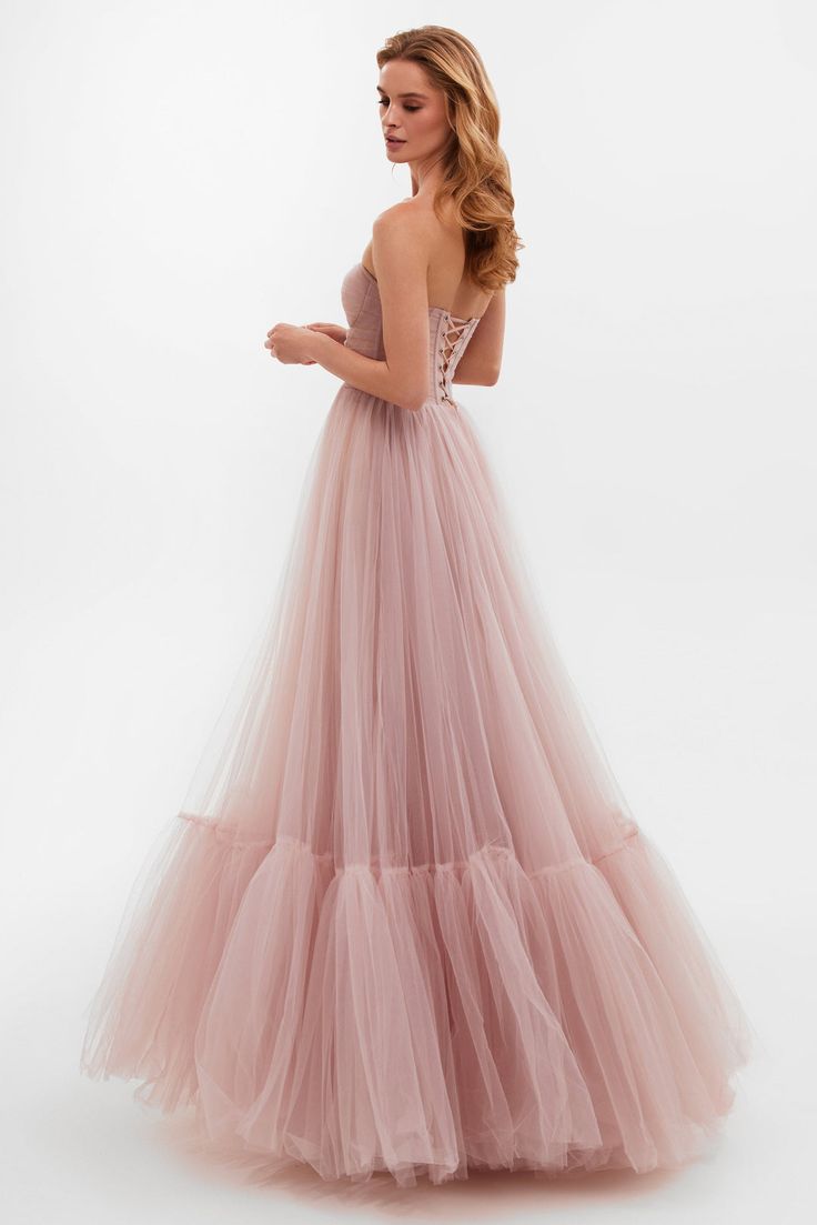 Buy Misty Rose Sheer Sleeves Maxi Tulle Dress at Milla Dresses. Wide size range from XXS to XXL. FREE shipping across the USA. Return in 30 days. Elegant Tulle Ball Gown With Ruched Bodice, Sweetheart Neckline Gown For Prom Season, Organza Corset Dress For Prom Season And Debutante Ball, Organza Corset Dress For Debutante Ball And Prom, Organza Corset Dress For Debutante Ball During Prom Season, Tulle Dress With Sweep Train And Sweetheart Neckline, Evening Tulle Dress With Sweep Train, Tulle Ball Gown With Sweep Train, Elegant Tulle Ball Gown With Lace Bodice