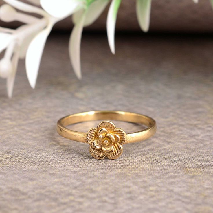 Eternity Daisy Gold Ring, thumb mid flower ring, cute flower ring, stacking flower ring, daisy love me, gift for her, gift for mom Size :- All Size Are Available METAL :- Brass ❥ Customers satisfaction is our biggest priority, please contact us with any questions/queries for future or existing orders, and we will do our best to make sure you are happy with your order. ♥ Please Make Sure to Include The Correct Address During Before Order. You Can return Item within 30 Days After Successful Delivery. We Offer 100% Money Back Guarantee If You Not Satisfied With Your Purchase. Return Charge Will Be Paid By Buyer Only. This is my shop link https://www.etsy.com/in-en/shop/AustereGifts?ref=seller-platform-mcnav Thank you🥰 for shopping with us! Dainty Flower Ring With Flower Charm, Rose Gold Flower Ring For Gift, Delicate Birth Flower Promise Ring, Delicate Flower-shaped Rings As Gifts, Dainty Flower Ring With Birth Flower Detail, Delicate Flower Shaped Promise Ring, Dainty Flower Ring With Birth Flower, Flower Shaped Birthstone Promise Ring, Delicate Flower Ring As A Gift