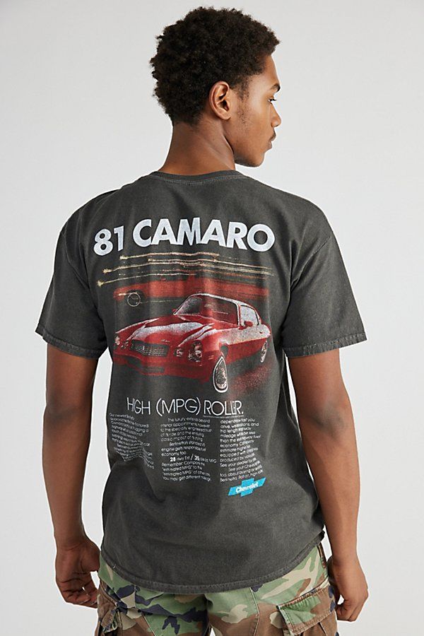 Chevy Camaro 1981 Ad graphic tee. Pay tribute to the ’81 Camaro with this jersey knit tee topped with graphics at the left chest and back. Fitted with short sleeves and a ribbed crew neck. Features Chevy Camaro 1981 Ad graphic tee Front and back graphics Ribbed crew neck Short sleeves Content + Care Cotton Machine wash Imported Size + Fit Model in Black is 6’2.5" and wearing size Medium Measurements taken from size Medium Chest: 21.5" Length: 29" | Chevy Camaro 1981 Ad Graphic Tee in Black, Men's at Urban Outfitters 81 Camaro, Fits With Shorts, Media Chest, Chevy Camaro, Knit Tees, Mens Graphic Tee, Top Tee, Knit Jersey, Chevy