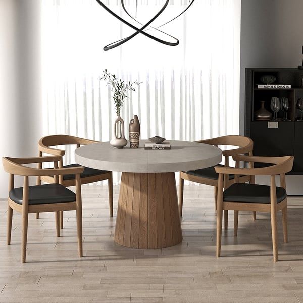 a round table with chairs around it