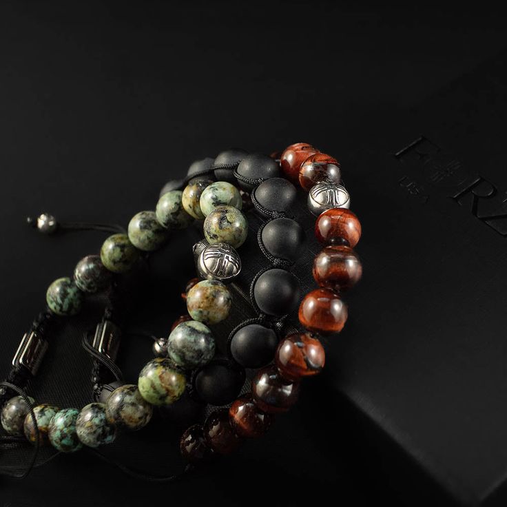 Bohemian and Luxurious, symbolizing the casually rich lifestyle of Los Angeles is the inspiration behind our LA stack. Get transported to the gorgeous city of angels with the LA stack featuring Tigers Eye, Black Agate and Turquoise Power Beads. Indulging the adventurous spirit and wandering heart that lives within all of us, our men's bracelet stacks have been crafted to provide a touch of class to your wardrobe throughout the year. Each exquistely curated stack includes a mix of spiritually hea Luxury Adjustable Gemstone Beaded Bracelets, Luxury Beaded Bracelets With Natural Stones, Luxury Gemstone Beads Bracelets For Healing, Bracelets Stack, Bracelet Stacks, Rich Lifestyle, City Of Angels, Men's Bracelet, Black Agate