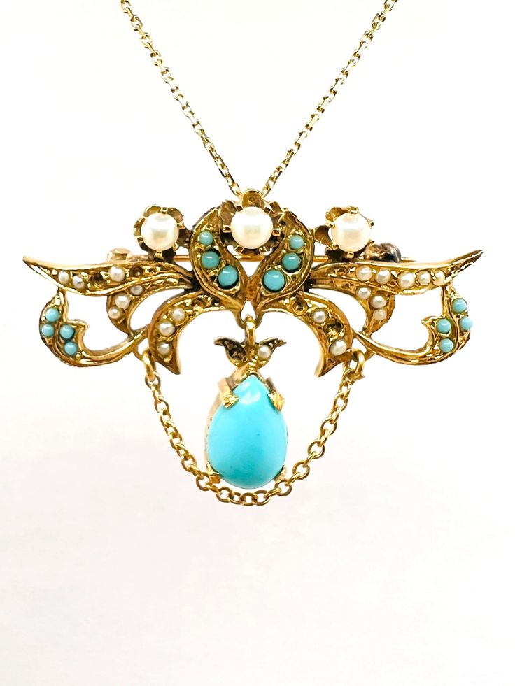 Beatiful Vintage 14K Yellow Gold Turquoise & Pearl Art Nouveau Brooch Pin Pendant Charm  A perfect gift for your loved one for any special occasion or holiday! Total Brooch Weight: 5.85g Brooch Length: 20.60mm Brooch Width: 39.10mm Gemstone: Turquoise, Pearl Item will be placed in a gift box. * Necklace not included. There is an additional charge of $150 if necklace is needed. * Victorian Turquoise Jewelry For Wedding, Luxury Turquoise Brooches, Elegant Turquoise Brooches For Collectors, Luxury Turquoise Brooches For Gift, Turquoise Cabochon Brooch As A Gift, Turquoise Cabochon Brooch For Gift, Turquoise Brooch For Formal Occasions, Blue Cabochon Brooches For Wedding, Heirloom Pendant Brooches As Gifts