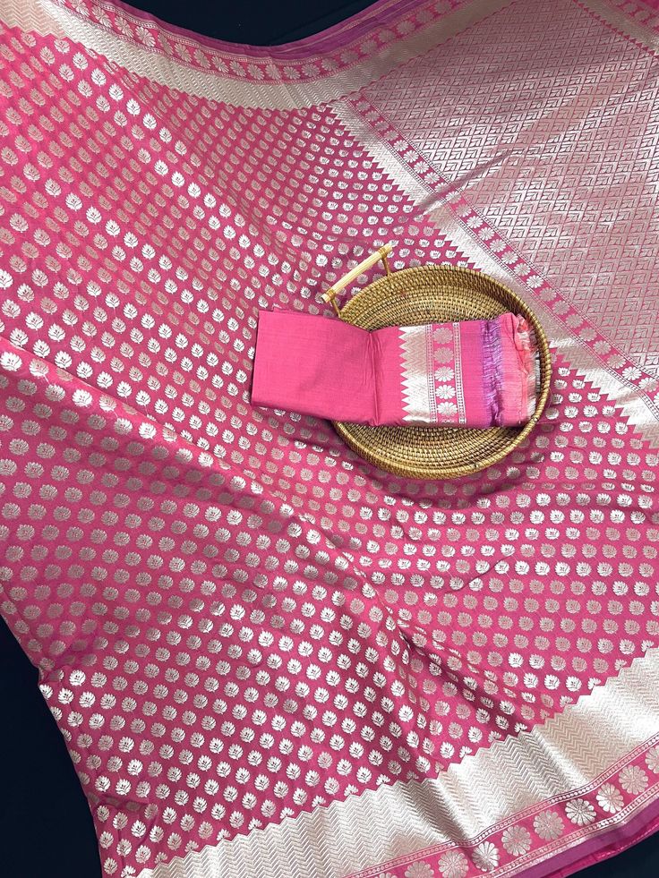 Onion Pink Color Traditional Handloom Banarasi Silk Saree with Sliver Zari Weave. Item : SareeColor : Onion PinkBase Fabric : Banarasi Silk (Non-Pure)Blouse piece : Comes with Blouse pieceBlouse material : Banarasi Silk (Non-Pure)Fall & Edging: Comes with Fall and edging (Pico) and tassels attached Disclaimers -: - Color variation is possible due to various reasons like phone or desktop setting, resolution etc. Please don't hold us responsible. Our aim is to put the exact color of the Saree.- Co Festive Silver Blouse Piece With Zari Work, Festive Silver Blouse Piece For Festivals, Festive Silver Blouse Piece, Silver Banarasi Silk Traditional Wear With Self Design, Silver Art Silk Saree For Eid, Festive Silver Saree Blouse Piece, Silver Zari Weaving Unstitched Saree, Silver Unstitched Saree With Zari Weaving, Silver Art Silk Dupatta With Self Design