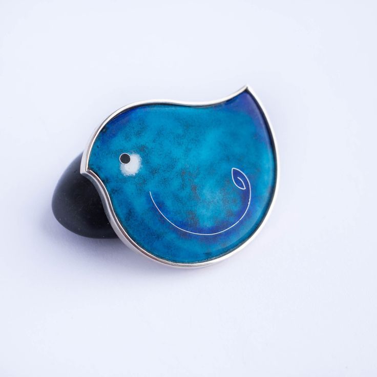 Silver bird brooch with hot cloisonné enamel. Handmade work. GEORGIAN CLOISONNE ENAMEL MINANQARI Workshop of silver jewelry with a soul. Masters create works in the technique of hot cloisonne enamel.  Our workshop has been working for 5 years to create exclusive handmade jewelry. Here you can buy silver rings, earrings, pendants, made by best masters of sunny Georgia. This technology is already 1200 years old, and today our masters continue the ancient Georgian art of Minankari, combining modern trends and centuries-old history. We want to give you the opportunity to wear not just jewelry, but peace with character. Masters create jewelry from precious metals: silver and gold. In their work they use enamel of a deep and rich color, which has not lost the purity and brightness of colors for Silver Enamel Pin For Gift, Silver Enamel Brooch Pin, Formal Silver Enamel Brooches, Artistic Enamel Brooch Pin For Gift, Handmade Enamel Brooches For Gifts, Collectible Blue Enamel Pin, Blue Enamel Brooch For Gift, Blue Enamel Brooch Gift, Blue Enamel Brooches For Gift