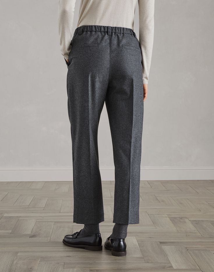 Virgin wool and cashmere flannel baggy trousers The excellence of Brunello Cucinelli materials is paired with the informal, urban proportions of these new Baggy trousers. The tailored pleats run lightly down the entire length of the leg and emphasize the relaxed, slightly cropped silhouette. The pull-on fit completes the comfortable, casual look of the trousers. Business Casual Bottoms For Winter With Straight Hem, Winter Workwear Bottoms With Straight Hem, Relaxed Fit Wool Pants For Fall, Fall Wool Pants With Straight Hem, Relaxed Fit Wool Bottoms For Workwear, Wool Tapered Leg Bottoms For Winter, Winter Wool Tapered Leg Bottoms, Wool Bottoms For Winter Workwear, Relaxed Fit Wool Bottoms For Fall