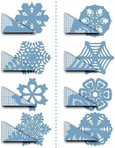 paper snowflakes are cut out and placed on top of each other