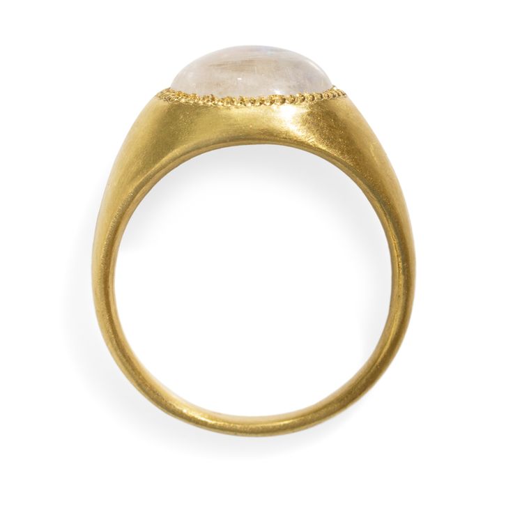 Catbird is proud to debut the work of Prounis, a new jeweler with an old soul. Her modern jewels are inspired by antiquity; each piece is hand wrought from rich, luxurious 22k gold. The Moonstone Roz Ring is luminous and weighty, a true instant heirloom. The wearer of this ring carries a symbol of classic beauty.Prounis jewels are made with a custom shade of the ancient 22-karat alloy; the malleability of 22-karat allows the jewels to shape to the wearer over time. 22-karat gold has a vibrant ye Gold Moonstone Ring Fine Jewelry, Luxury Gold Rings With Moonstone, Heirloom Yellow Gold Moonstone Cabochon Ring, Timeless Gold Polished Moonstone Ring, Luxury Polished Moonstone Ring In 14k Gold, Timeless Gold Moonstone Ring With Polished Finish, Hand Forged Moonstone Jewelry In Yellow Gold, Elegant Gold Moonstone Ring In Brass, Luxury 14k Gold Moonstone Ring With Polished Finish