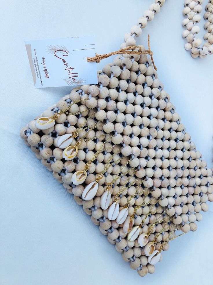 "Sea Bag, Wooden Shoulder Bag, Wooden Bead Bag, Sea Shell Bag, Bead Bag, Shoulder Bag, Bead Bag Vintage Dimensions - Width: 5,90\" (15 cm.) - Height: 7,87\" (20 cm.) - Depth: 0,78'' (2 cm.) My bags are 100% handmade.This size making it perfect to hold your keys, cards, money. I hope you collect great memories with this bag. All items are made in a clean, smoke-free home SHIPPING - This clutch is made and ready to ship - Ships worldwide from İstanbul, Turkey - Processing time prior to shipping is Sea Bags, Shell Bag, Cutest Thing Ever, Bag Vintage, Beaded Bags, Great Memories, Custom Bags, Sea Shell, Bag Shoulder