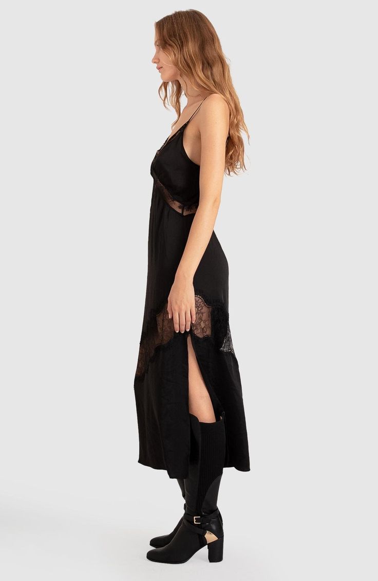 The Heavenly Bodies Lace Slip Dress is a nod to vintage glam with a contemporary twist. The soft satin and side split ensure all-day comfort, while its versatility allows for effortless styling, pair it with heels for a night out or embrace casual chic with sneakers and a leather jacket. Hand Wash Do Not Bleach Dry Flat Iron On Low Heat Elegant Satin Dress With Side Slits For Night Out, Chic Evening Slip Dress With Lace Trim, Sleeveless Satin Day Dress, Elegant Maxi Length Slip Dress For Daywear, Chic Night Dress With Lace Trim, Sleeveless Satin Finish Day Dress, Chic Night Dresses With Satin Finish, Sleeveless Satin Finish Dress For Daywear, Chic Satin Finish Night Dresses