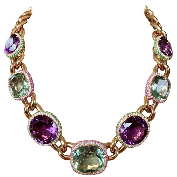 For Sale on 1stDibs - Statement necklace in 18 Karat rose gold, set with 4 Amethysts weighing 68,26 ct. All 4 Amethysts are surrounded by Diamonds and Tsavorites. 3 Prasiolites Traditional Luxury Multicolor Jewelry, Luxury Multicolor Women's Necklace, Traditional Multicolor Luxury Necklaces, Luxury Multicolor Jewelry With Halo Setting, Champagne Diamond Necklace, Runway Necklace, Bold Statement Necklaces, Horseshoe Pendant, Horseshoe Necklace