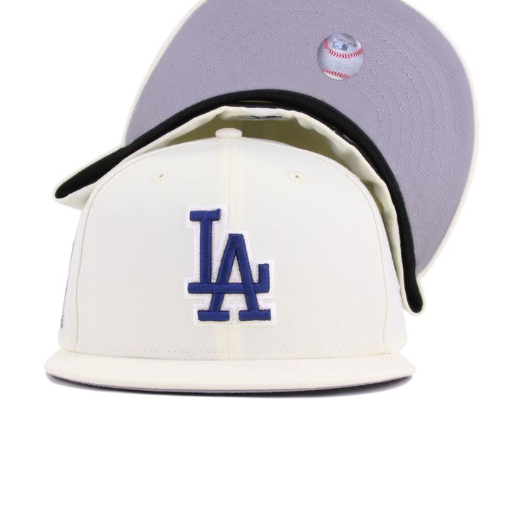 the los angeles dodgers'new era cap is shown in white and purple with a black brimmed peak