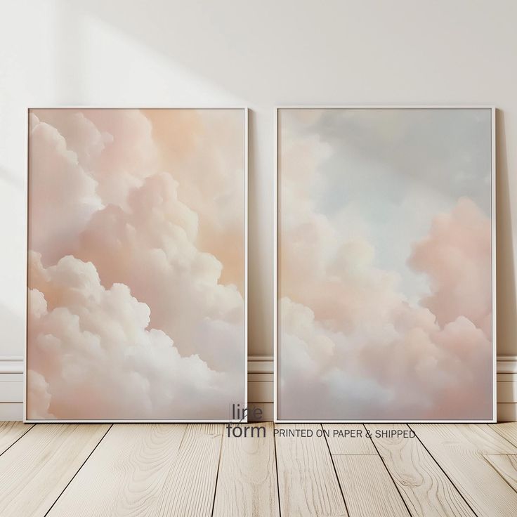 two paintings on the wall in an empty room with wood flooring and white walls