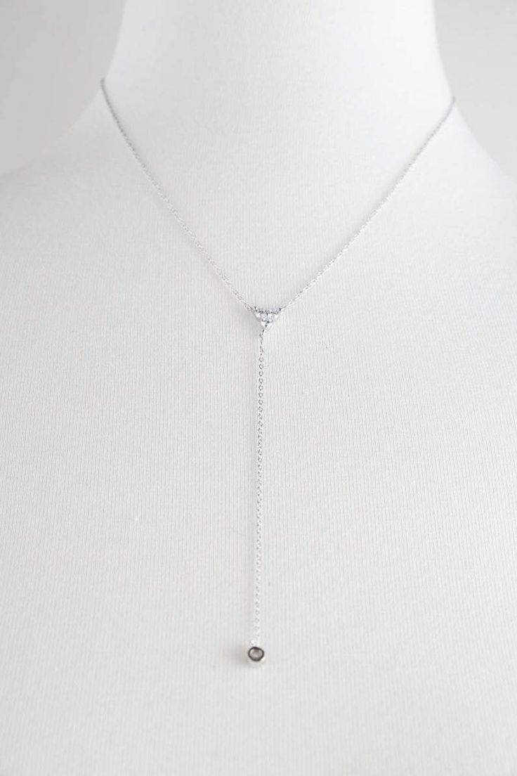 This gorgeous Multi Stone Lariat Necklace is available in 18k gold vermeil and sterling silver. The necklace can be worn on it's own or can easily be layered with other chokers and necklaces. Wear this to any occasion and be ready to shine! This item is also referred to as Y Necklace. MEASUREMENTS The length of the Multi Stone Lariat Necklace is 16 inches around the neck with a 3.5 inch drop and a cubic zirconia charm. Each necklace comes with an additional 2.5-inch extender chain to easily adju Minimalist White Gold Lariat Necklace With Delicate Chain, Delicate White Gold Lariat Necklace With Adjustable Chain, Dainty White Gold Lariat Necklace With Delicate Chain, Adjustable Chain Fine Jewelry Necklace, Backdrop Necklace With Long Drop And Adjustable Chain, Silver Pendant Lariat Necklace With Adjustable Chain, Silver Lariat Necklace With Pendant And Adjustable Chain, Minimalist Delicate Chain Lariat Necklace For Formal Events, Elegant Adjustable Teardrop Pendant Jewelry