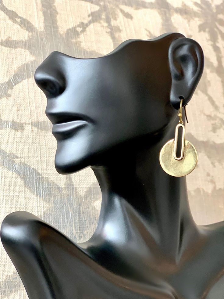 Modern geometric brass pendants make these earrings very versatile to go with anything. Geometric Brass Earrings For Gift, Modern Bronze Brass Jewelry, Modern Brass Drop Plug Earrings, Nickel-free Geometric Brass Earrings, Nickel Free Brass Drop Linear Earrings, Chic Geometric Gold Jewelry, Chic Gold Geometric Jewelry, Gold Geometric Brass Jewelry, Modern Brass Dangle Jewelry