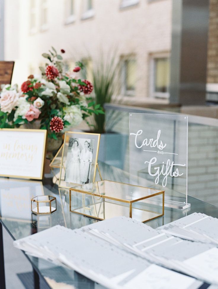 a glass table topped with lots of cards