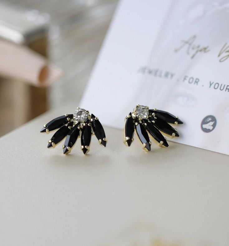 These vintage but modern earrings are the perfect addition to any formal attire long after that special day. The elegance of these Black Swarovski crystal earrings will make a statement entirely on their own but will also stand out when paired with other pieces of jewelry. For more earrings in my shop: https://www.etsy.com/il-en/shop/Ayajewellery?ref=listing-shop-header-item-count§ion_id=18067180 * I plate the earrings 18 karat gold / silver / rose gold Over Brass ** Nikel free ** especially gir Elegant Crystal Cluster Earrings, Elegant Clip-on Crystal Earrings, Elegant Evening Cluster Clip-on Earrings, Elegant Clip-on Cluster Earrings For Evening, Elegant Formal Clip-on Crystal Earrings, Elegant Plated Crystal Earrings For Anniversary, Elegant Crystal Earrings With Plating For Anniversary, Elegant Crystal Cluster Earrings For Evening, Elegant Cubic Zirconia Crystal Earrings For Evening