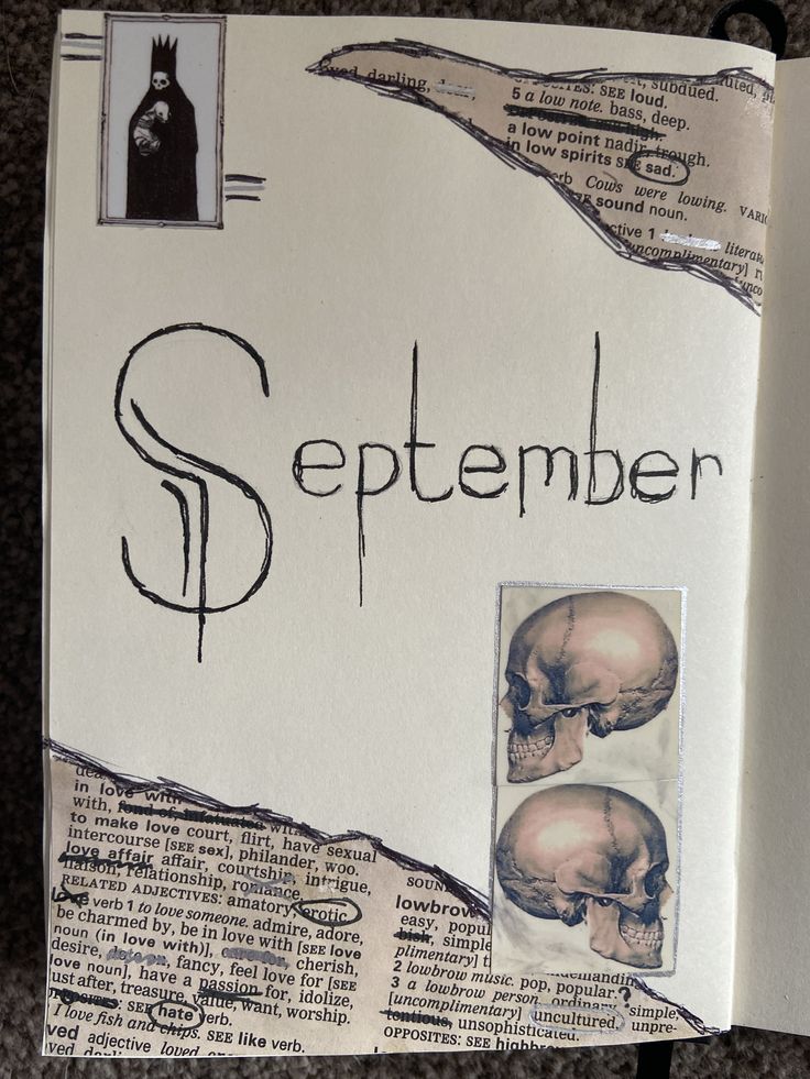 an open book with pictures of skulls and words written in black ink on top of it