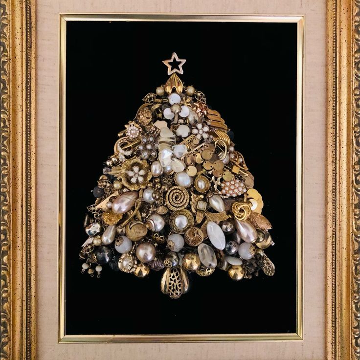 This Vintage Jewelry Mosaic Is Made Of 45+ Recycled Gold Tone, Antique Gold Tone & Brushed Gold Tone Earrings, Brooches And Pendants Mixed With Faux Pearls Of Every Size & Shape, Thoughtfully Arranged To Look Like Boughs Of Pine Needles On Top Of Black Velvet Until The Perfect “Golden Pine V” Emerged! Finally It Was Framed In A Beautiful Vintage Frame Measuring 18” X 14”. “Saving The Planet One Brooch At A Time,” By Keeping Old, Broken Or Unwanted Pieces Out Of Our Landfills & Oceans. Jewelry Mosaic, Saving The Planet, Jewelry Christmas Tree, Vintage Frame, Pine Needles, Recycled Gold, Vintage Frames, Conversation Piece, Vintage Earrings