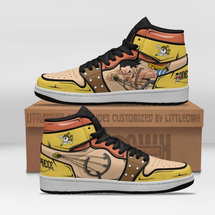 a pair of yellow and brown sneakers with cartoon characters on them, sitting on top of a cardboard box