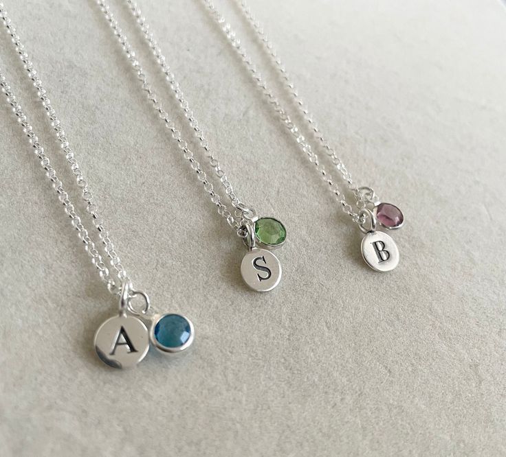 "Beautiful disc initial birthstone necklace - would make a perfect birthday gift for a loved one or treat yourself to this lovely necklace! *Chain is of high quality sterling silver * Sterling silver disc initial (disc measures 8mm) The letter is on one side only, the back is blank *Sterling silver birthstone charm (charm measures 6mm) *Chain lengths available are 16\" & 18\"inches (please add length required in the personalisation box) Necklace will come complete in a lovely white gift box." Initial Birthstone Necklace, Birthstone Necklace Mothers, Personalised Necklace, Birthday Necklace, Box Necklace, Pretty Bracelets, Necklace Box, Valentines Gifts For Her, Lovely Ring