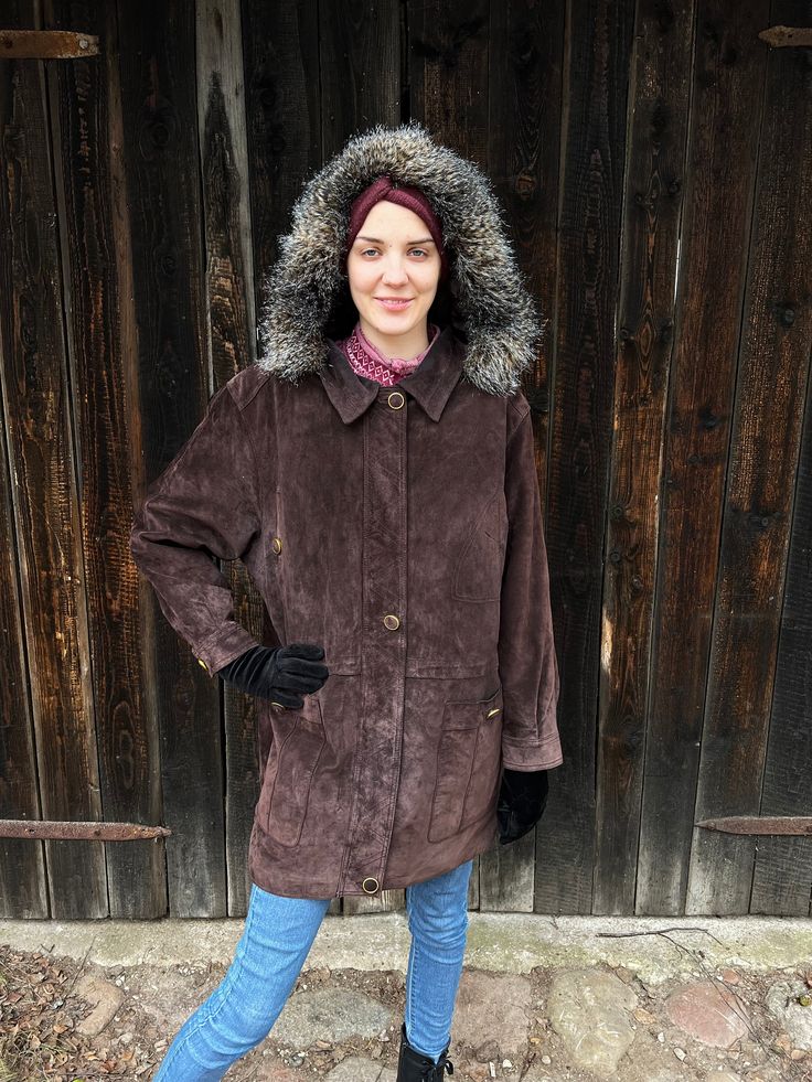 "Vintage Women's Suede Leather Parka Coat Brown Leather Coat With Fur Hood Leather Long Jacket Genuine Leather Jacket Size Medium to Large Label size: 23 Estimated size: M/L Measurements: (lying flat) Length: 32.5\"/ 83 cm Shoulders: 20\"/ 51 cm Pit to pit: 25\"/ 63 cm Hips: 25\"/ 63 cm Sleeve: 23\"/ 59 cm Models size:  height: 6 feet/ 182 cm Bust: 37.7\" / 96 cm  Waist: 29.1\" / 74 cm Hips: 32.2 / 82 cm Please check measurements to insure a proper fit. Remember to allow yourself some extra room Brown Double-lined Hood Parka For Fall, Brown Parka With Double-lined Hood For Fall, Brown Double-lined Hooded Outerwear For Cold Weather, Brown Outerwear With Double-lined Hood For Cold Weather, Brown Outerwear With Detachable Hood For Cold Weather, Brown Leather Hooded Winter Jacket, Brown Hooded Leather Outerwear, Brown Leather Hooded Jacket For Winter, Hooded Brown Outerwear For Work