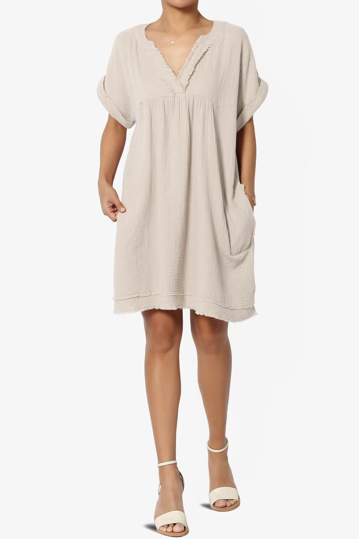 Casual Boho Tunic Dress For Spring, Flowy Cotton Mini Dress, Summer Flowy Cotton Boho Dress, Cotton Short Sleeve Mini Dress For Beach, Cotton Mini Dress With Short Sleeves For Beach, Casual Neutral Summer Dress, Casual Cotton Mini Dress For Day Out, Flowy Boho Dress With Short Sleeves, Flowy Short Sleeve Boho Dress In Casual Style