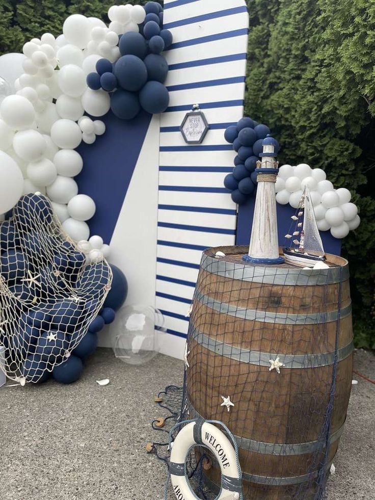 balloons and decorations are set up on the side of a building