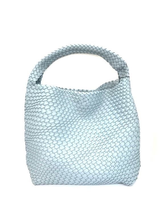 Tote-style woven bag with one top strap. A perfect touch to any outfit, on the go or out on the town. Versatile Satchel With Braided Handles For On-the-go, Woven Leather Hobo Tote Bag For On-the-go, Woven Leather Crossbody Bucket Bag For On-the-go, Intrecciato Weave Rectangular Hobo Bag For Travel, Intrecciato Weave Hobo Shoulder Bag For On-the-go, Rectangular Intrecciato Hobo Bag For Travel, Chic Woven Leather Straw Shoulder Bag, Chic Woven Leather Hobo Bag For On-the-go, Chic Crossbody Satchel With Woven Leather