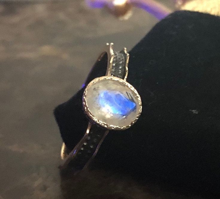 Elegant, vintage, handcrafted, genuine rainbow moonstone rings, 18k gold plated 925 sterling silver. Surface size: 9*7 mm. Band width: 3 mm. Stone weight: 1 grams. Sizes: 6, 7, & 8. Handmade 14k Gold Oval Moonstone Ring, Handmade Oval Moonstone Ring In 14k Gold, Hand Forged Oval Moonstone Ring, Hand Forged Gold Oval Moonstone Ring, Handmade 14k Gold Moonstone Ring For Anniversary, Hand Forged Oval Moonstone Ring For Anniversary, Hand-forged Oval Moonstone Ring For Anniversary, Oval Hand Forged Moonstone Ring For Anniversary, Heirloom Moonstone Ring Hallmarked