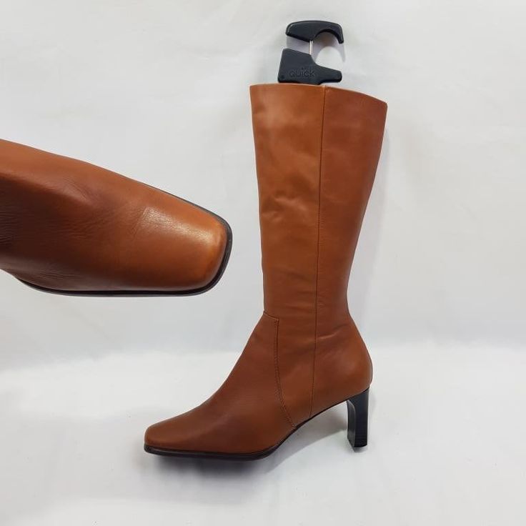 Introducing vintage brown boots with a low heel. These women's knee-length boots with square toe are comfortable and practical. Thanks to the elastic at the top, it fits the shin well. The retro style, will emphasize the beauty of your legs. They are made of genuine leather and fit well around the shank. Made in Italy. The fashion of the 90's - 00's offers you an iconic look that will stand the test of time. In good condition. On request I can send additional photos. Materials: leather The circu Fitted Leather Mid-calf Boots, Fitted Mid-calf Boots For Formal Occasions, Formal Mid-calf Boots, Formal Snug-fit Mid-calf Boots, Formal Fitted Mid-calf Boots, Brown Leather Mid-calf High Boots, Fitted Leather Mid-calf Heeled Boots, Fitted Mid-calf Platform Boots For Fall, Fall Fitted Heeled Boots With Square Toe