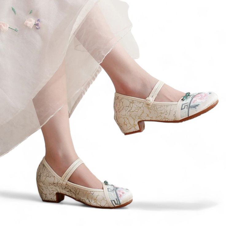 ❁Embrace Comfort and Stand Out in Style: Floral & Geometric Block Heels ❁Step into a world of unique style and delightful comfort with our captivating floral and geometric block heels! Featuring a stunning 4cm/1.6-inch block heel and a playful design, these shoes elevate your everyday look with a touch of artistic flair and modern charm. ❁The front of the shoe is adorned with delicate pink flower embroidery, beautifully complemented by a geometric pattern trim.  The back features a unique printe Beige Round Toe Wedding Shoes For Spring, Beige Closed Toe Wedding Shoes For Spring, Vintage White Flat Heels, White Floral Embroidery Heels, White Heels With Floral Embroidery, White Embroidered Round Toe Heels, White Embroidered Summer Heels, White Floral Embroidered Closed Toe Heels, White Floral Embroidered Heels