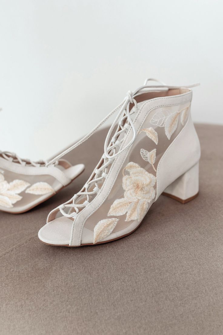 Romantic lace wedding boots with a peep toe and lace-up down the front. They are decorated with lace embroidery with roses and roe leaves. Thanks to the adjustable lacing, this pair will fit any foot width. Comfortable wedding bridal shoes for a day of dancing and fun, the elegant block heel is only 5.5 cm / 2.2 inches. Inside there is a soft memory foam insole, which gives a feeling of additional comfort when walking. Tunit outsole is made of a mixture of leather chips and rubber, it's more wea Floral Wedding Shoes, Lace Wedding Boots, Boots With Laces, 2024 Fits, Secret Wedding, Bridal Boots, Pointy Heels, Wedding Boots, Wedding Shoes Bride