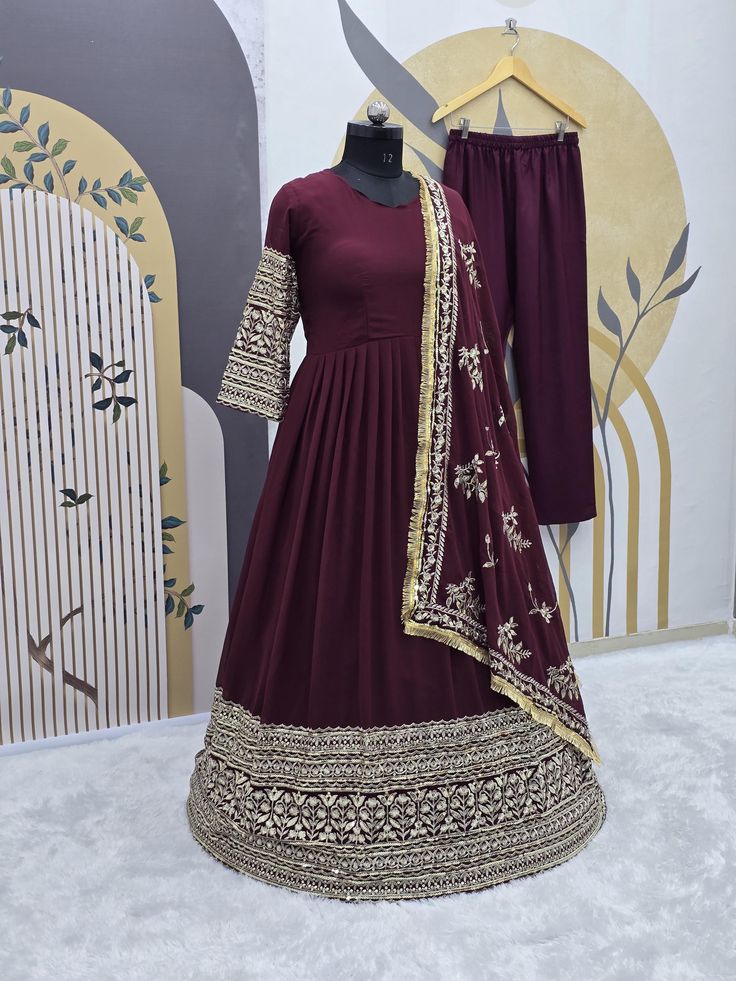 Fabric Detail* 🧵 👗 *Gown Fabric* : Heavy Faux Georgette With *Full Heavy Embroidery Sequence Work* with Sleeve* 👗 *Gown Inner* : Micro Cotton 👗 *Gown Size* ✂️📏 : *XL(42) With XXL(44) Margin* *(FULLY STITCHED)* 👗 *Gown Length* : 51-52 Inches  👗 *Gown Flair*     : 3 Meter  👗 *Bottom Fabric* : Micro Cotton Full stitched Free Size With Elastic 👗 *Dupatta Fabric* : Heavy Faux Georgette With *Heavy Embroidery Sequence work and Lace Border*    ⚖️ *Weight* :- 1 kg CARE INTRODUCTION:- HAND WASH Floor-length Sets With Dabka Work For Navratri, Embroidered Maxi Length Set For Diwali, Fitted Dress With Dabka For Celebration, Long Georgette Anarkali Set For Festivals, Embroidered Full Length Wedding Sets, Bollywood Style Full-length Wedding Sets, Navratri Dabka Work Floor-length Set, Floor-length Set With Zari Work For Eid, Long Choli With Dabka Work For Festive Occasions